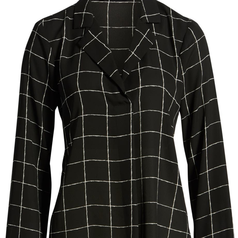 “All in Favor” black and white long sleeve, loose fit, v-neck, collared blouse.